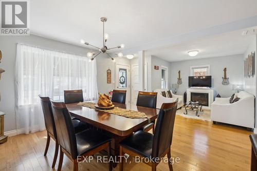 5993 Coholan Street, Niagara Falls, ON - Indoor Photo Showing Dining Room With Fireplace