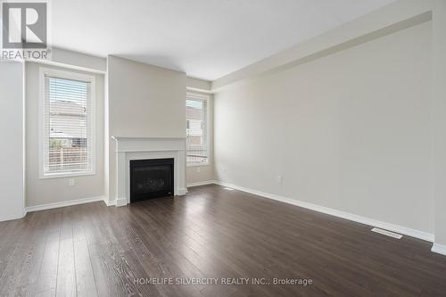 7573 Cottonwood Drive, Niagara Falls, ON - Indoor Photo Showing Living Room With Fireplace