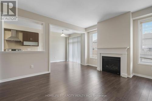 7573 Cottonwood Drive, Niagara Falls, ON - Indoor Photo Showing Living Room With Fireplace