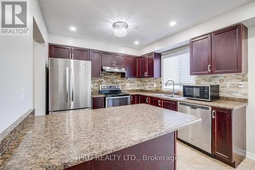387 Bussel Crescent, Milton, ON - Indoor Photo Showing Kitchen With Double Sink
