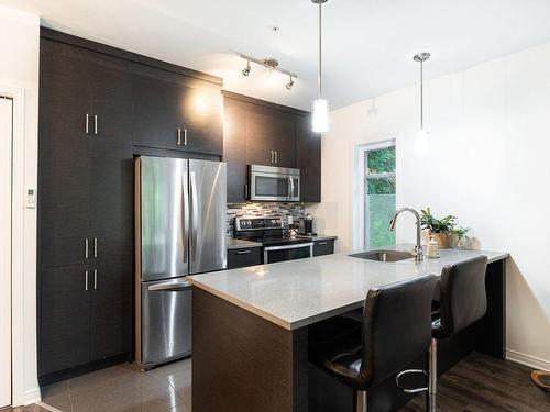 Cuisine - 103-9640 Rue William-Fleming, Montréal (Lasalle), QC - Indoor Photo Showing Kitchen With Upgraded Kitchen