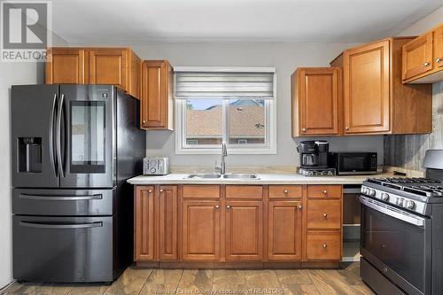 1709 Marentette, Windsor, ON - Indoor Photo Showing Kitchen With Double Sink