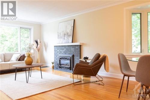 566 Athlone Avenue S, Ottawa, ON - Indoor Photo Showing Living Room With Fireplace
