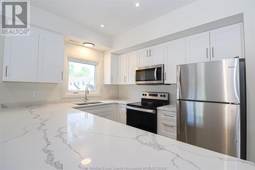 233 Watson Unit# 106, Windsor, ON - Indoor Photo Showing Kitchen With Stainless Steel Kitchen