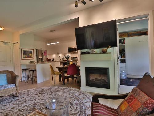 216-1375 Bear Mountain Pkwy, Langford, BC - Indoor Photo Showing Living Room With Fireplace