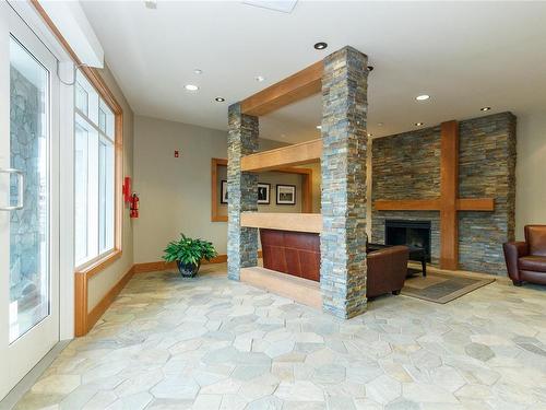 216-1375 Bear Mountain Pkwy, Langford, BC - Indoor With Fireplace