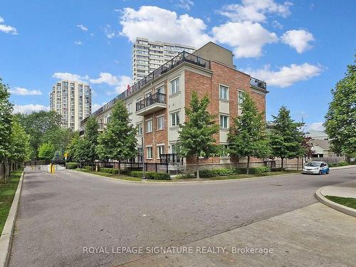 101-17 Coneflower Cres, Toronto, ON - Outdoor With Facade