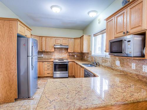 Cuisine - 550 Boul. Neptune, Dorval, QC - Indoor Photo Showing Kitchen With Double Sink