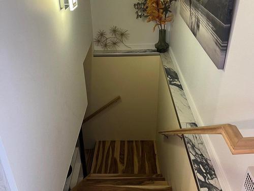 Staircase - 65 8E Rue, Chapais, QC - Indoor Photo Showing Other Room