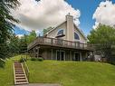 Frontage - 135  - 137 Rue Du Rapide, Mont-Tremblant, QC  - Outdoor With Deck Patio Veranda 