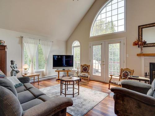 Salon - 135  - 137 Rue Du Rapide, Mont-Tremblant, QC - Indoor Photo Showing Living Room With Fireplace