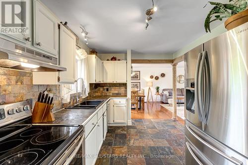 1057 Base Line Road, Kawartha Lakes, ON - Indoor Photo Showing Kitchen With Double Sink