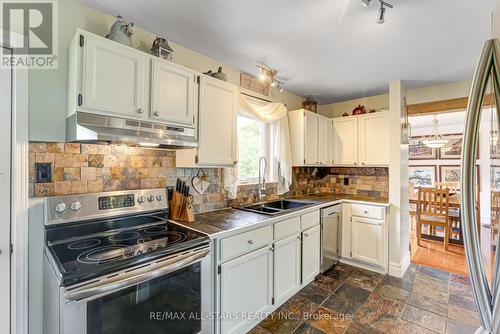 1057 Base Line Road, Kawartha Lakes, ON - Indoor Photo Showing Kitchen With Double Sink