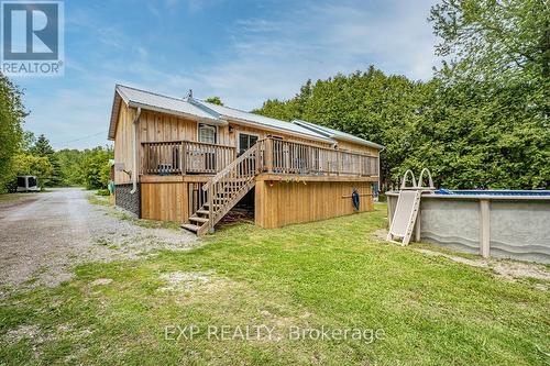 130 Crawford Road, Kawartha Lakes, ON - Outdoor With Above Ground Pool With Deck Patio Veranda