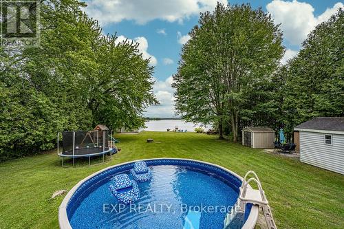 130 Crawford Road, Kawartha Lakes, ON - Outdoor With Above Ground Pool With Backyard