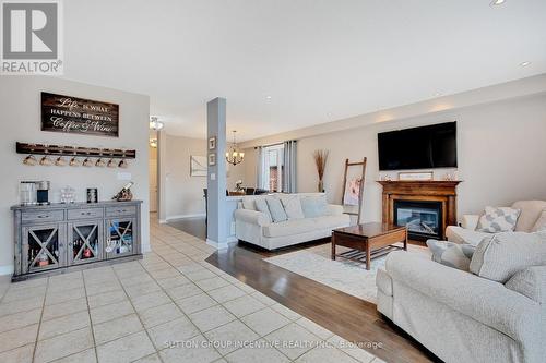 920 Booth Avenue, Innisfil, ON - Indoor Photo Showing Living Room With Fireplace