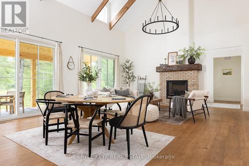 303 Clearwater Lake Road, Huntsville, ON - Indoor Photo Showing Dining Room With Fireplace