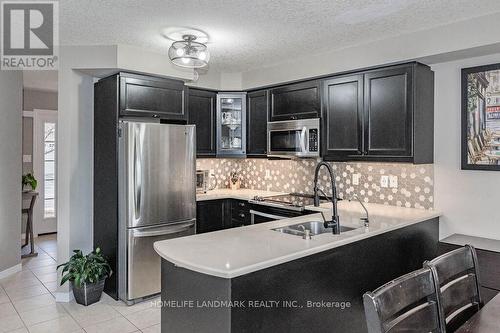 27 - 255 Summerfield Drive, Guelph (Pine Ridge), ON - Indoor Photo Showing Kitchen With Double Sink With Upgraded Kitchen