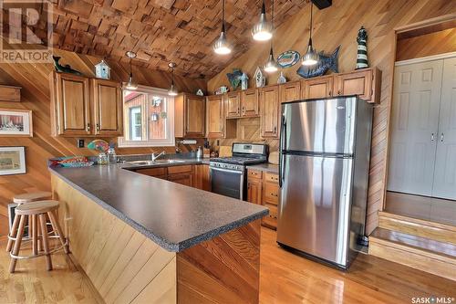 Arrowhead Island, Lac La Ronge, SK - Indoor Photo Showing Kitchen With Double Sink