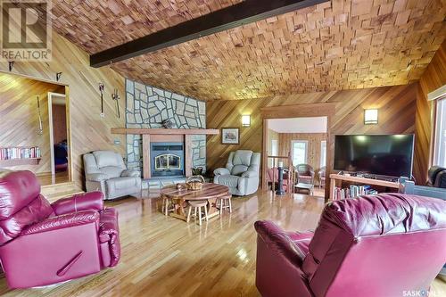 Arrowhead Island, Lac La Ronge, SK - Indoor Photo Showing Living Room With Fireplace