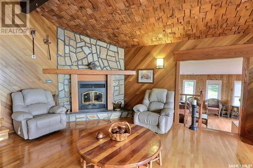 Arrowhead Island, Lac La Ronge, SK - Indoor Photo Showing Living Room With Fireplace