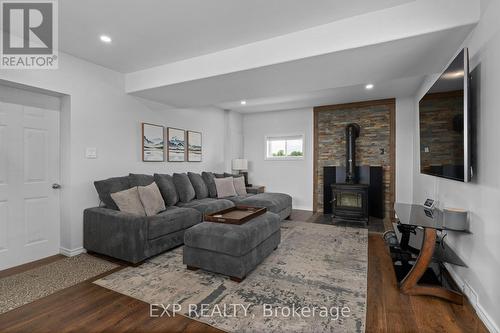 1306 Little Creek Road, Greater Napanee, ON - Indoor Photo Showing Living Room With Fireplace