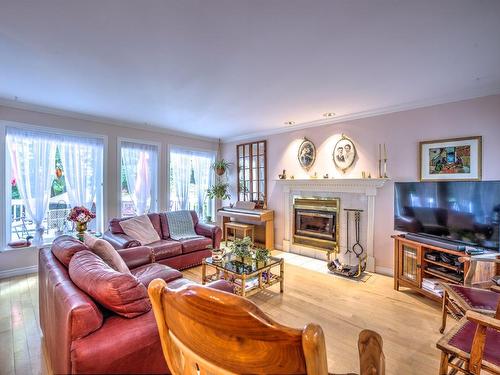 Living room - 775 Rue Du Patrimoine, Prévost, QC - Indoor Photo Showing Living Room With Fireplace