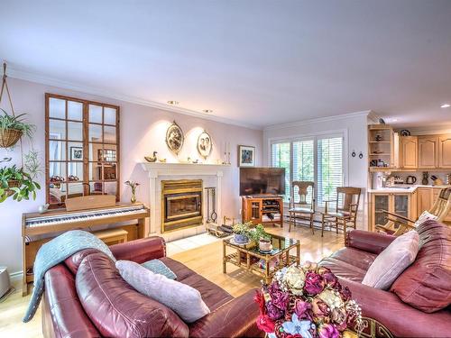 Living room - 775 Rue Du Patrimoine, Prévost, QC - Indoor Photo Showing Living Room With Fireplace