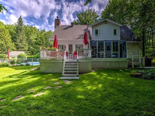 Back facade - 775 Rue Du Patrimoine, Prévost, QC - Outdoor With Deck Patio Veranda