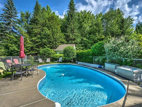 Pool - 775 Rue Du Patrimoine, Prévost, QC - Outdoor With In Ground Pool With Backyard