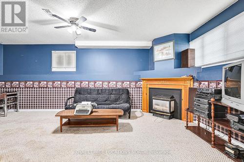 34 Reid Crescent, Collingwood, ON - Indoor Photo Showing Living Room With Fireplace