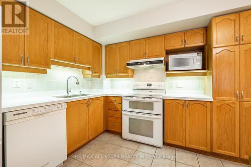 205 - 2500 Rutherford Road, Vaughan, ON - Indoor Photo Showing Kitchen With Double Sink