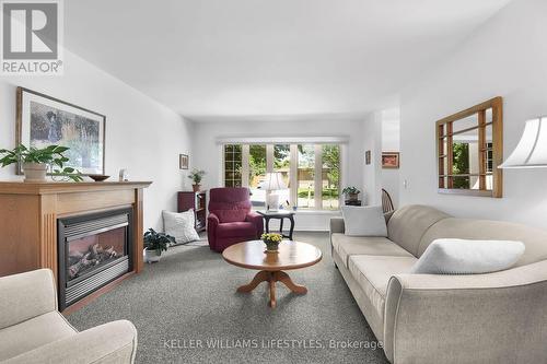 3 Surrey Crescent, London, ON - Indoor Photo Showing Living Room With Fireplace