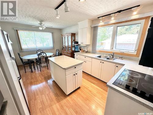 211 Ash Drive, Weyburn, SK - Indoor Photo Showing Kitchen With Double Sink