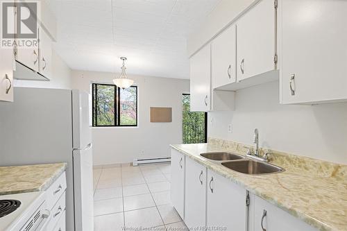 9155 Wyandotte Street East, Windsor, ON - Indoor Photo Showing Kitchen With Double Sink