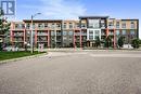 219 - 4040 Upper Middle Road, Burlington (Tansley), ON  - Outdoor With Balcony With Facade 