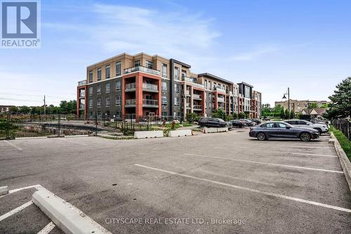 219 - 4040 Upper Middle Road, Burlington (Tansley), ON - Outdoor With Balcony With Facade