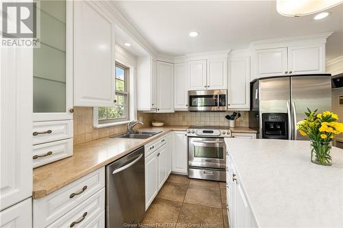 123 Arsene St, Dieppe, NB - Indoor Photo Showing Kitchen With Double Sink