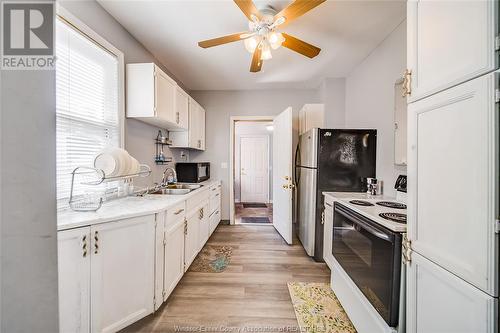 1333 Wyandotte Street West, Windsor, ON - Indoor Photo Showing Kitchen With Double Sink