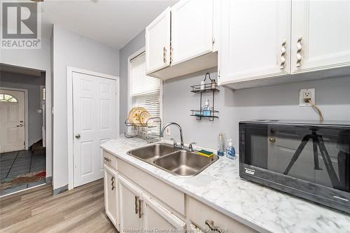 1333 Wyandotte Street West, Windsor, ON - Indoor Photo Showing Kitchen With Double Sink