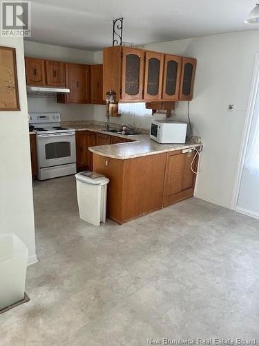 231 Goderich Street, Dalhousie, NB - Indoor Photo Showing Kitchen With Double Sink