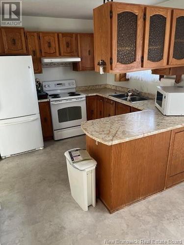 231 Goderich Street, Dalhousie, NB - Indoor Photo Showing Kitchen With Double Sink