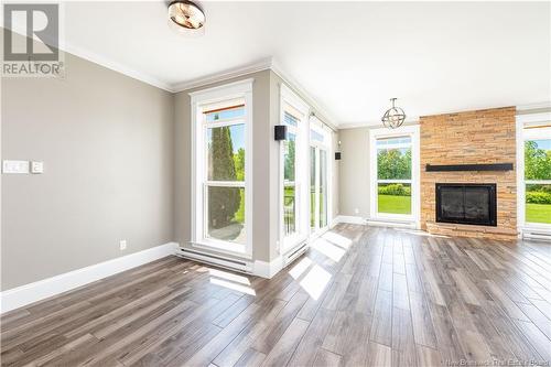 1095 Route 133, Grand-Barachois, NB - Indoor Photo Showing Living Room With Fireplace