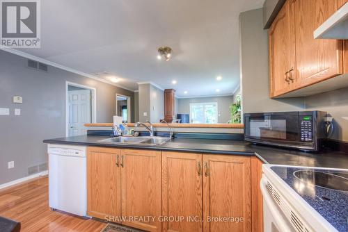 28 Peglar Crescent, Centre Wellington (Fergus), ON - Indoor Photo Showing Kitchen With Double Sink