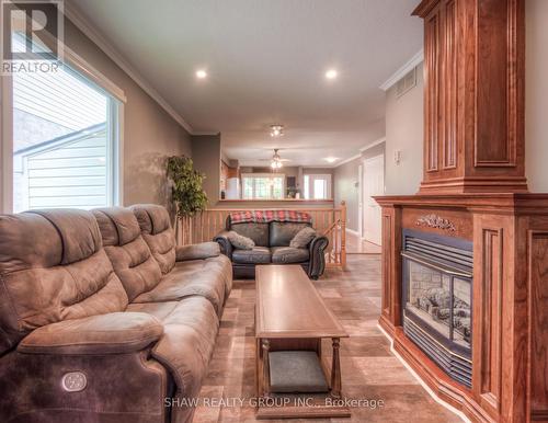 28 Peglar Crescent, Centre Wellington (Fergus), ON - Indoor Photo Showing Living Room With Fireplace