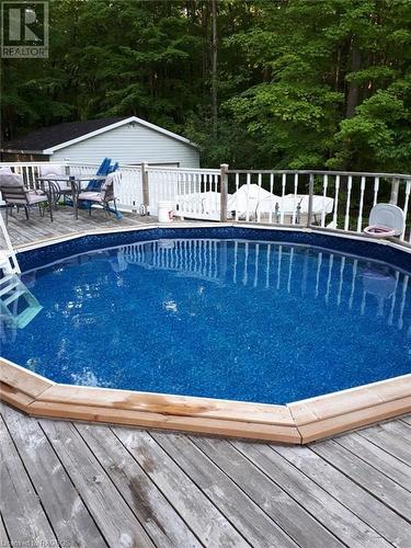 243 Spry Lake Road, Oliphant, ON - Outdoor With Above Ground Pool With Backyard