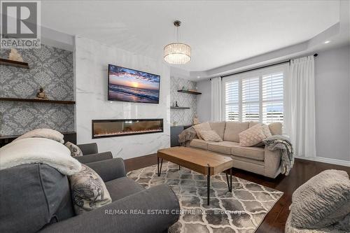 111 Garinger Crescent, Hamilton (Binbrook), ON - Indoor Photo Showing Living Room With Fireplace