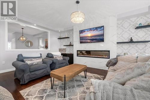 111 Garinger Crescent, Hamilton (Binbrook), ON - Indoor Photo Showing Living Room With Fireplace