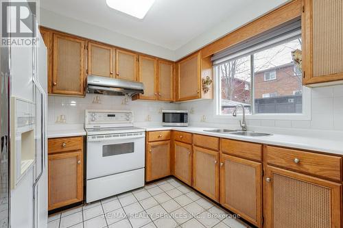 16 Sunforest Drive, Brampton, ON - Indoor Photo Showing Kitchen With Double Sink