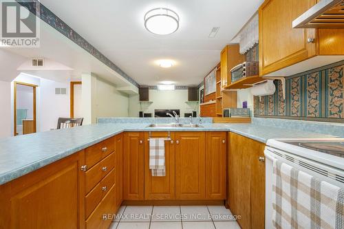 16 Sunforest Drive, Brampton, ON - Indoor Photo Showing Kitchen With Double Sink